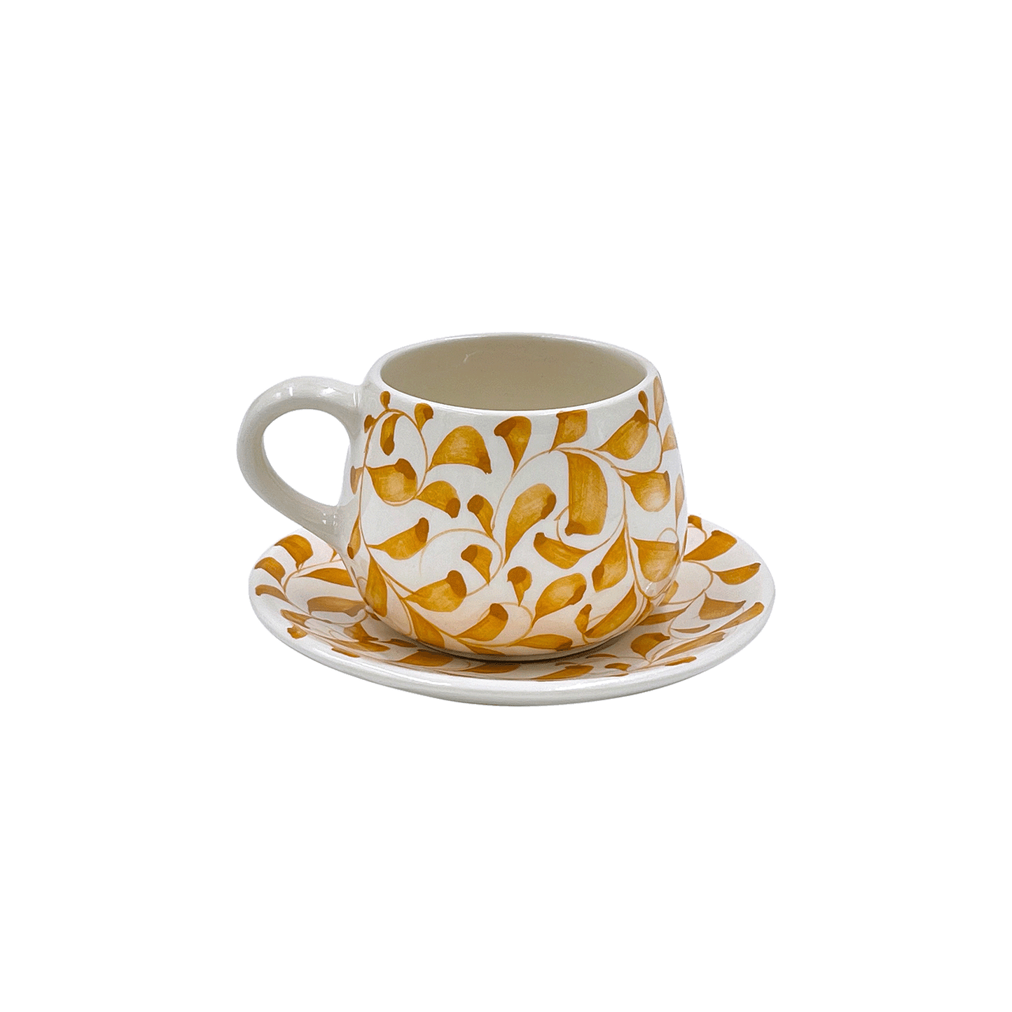Tazza da caffè e piattino con motivo a pergamena gialla
