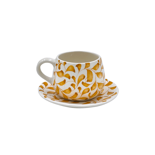 Tazza da caffè e piattino con motivo a pergamena gialla