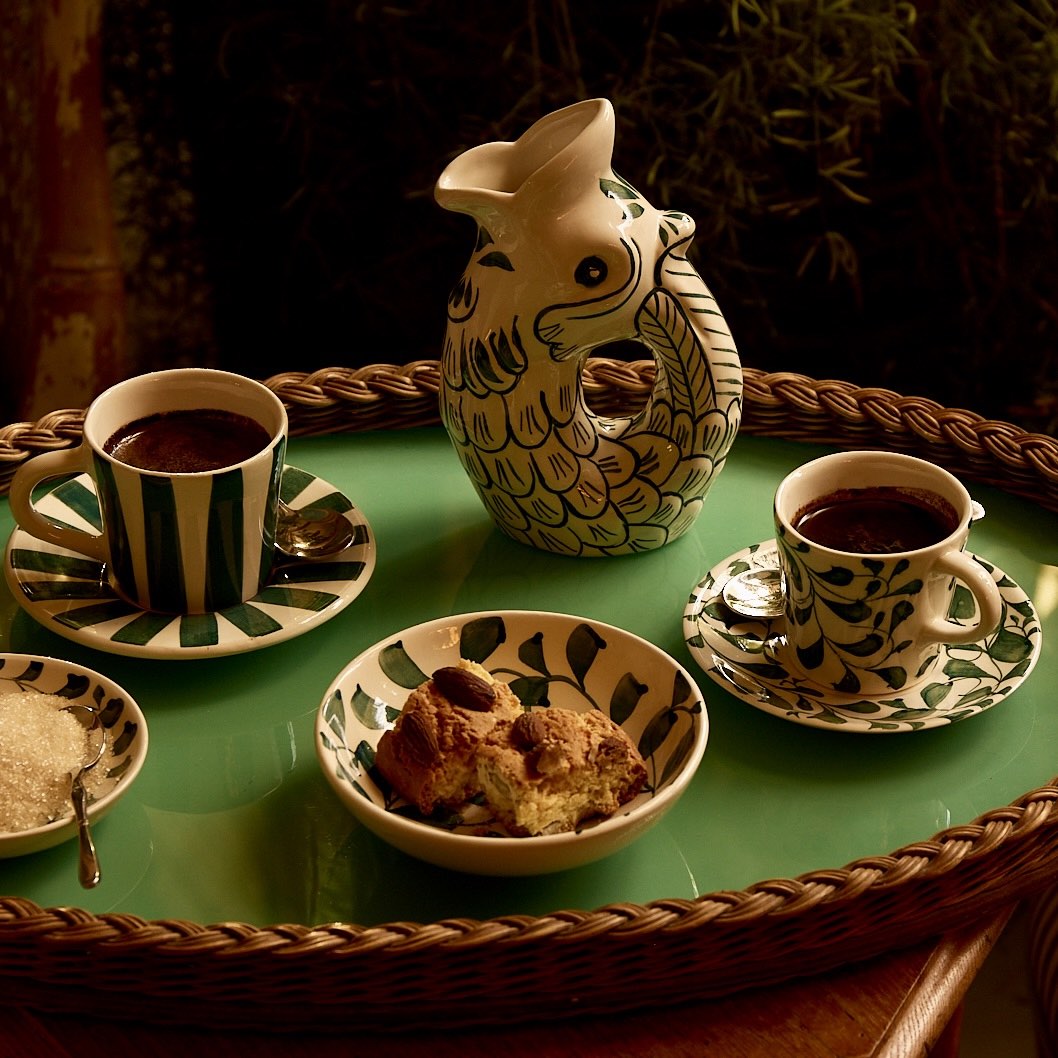 Tazza da caffè espresso e piattino a strisce verdi